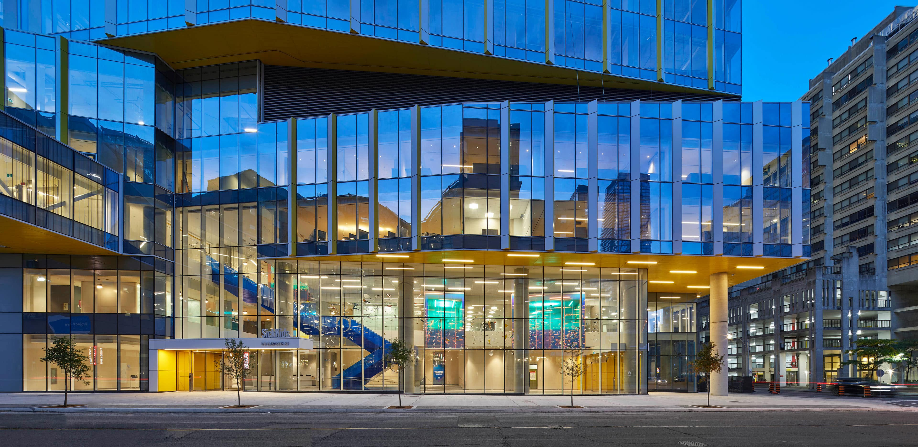 Front entry of hospital with glass exteriors
